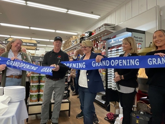 Jim Morton, store manager for Baskin’s ACE Hardware in Orleans, cuts the ribbon during a ceremony Monday to celebrate the business’s move to its new location at the former Christmas Tree Shop on South Orleans Road.  RYAN BRAY PHOTOS
