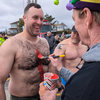 Veteran April Fools attest, the cold body paint is even worse than the shock of the swim. ALAN POLLOCK PHOTOS