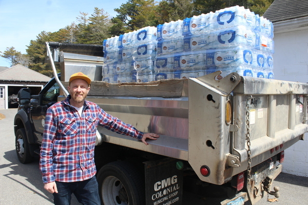 Water Superintendent Dan Pelletier is helping coordinate a distribution of bottled water to North Harwich residents Wednesday. WILLIAM F. GALVIN PHOTO