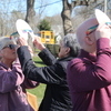 The pie slice protection created by library staff for the eclipse was appreciated by many people in Brooks Park on Monday. WILLIAM F. GALVIN PHOTOS