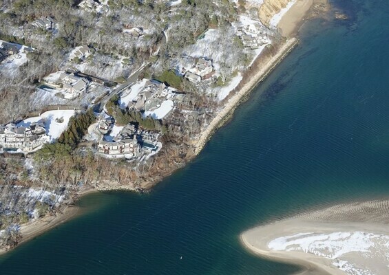 The remnants of South Beach, seen at the bottom of this photo, are squeezing the navigation channel against Morris Island, destroying part of the revetment that protects four properties along the shoreline. SPENCER KENNARD PHOTO