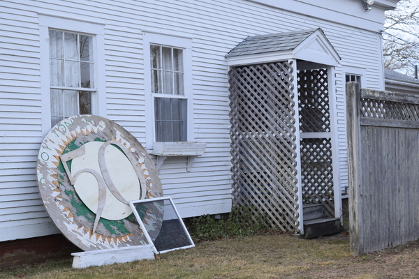 Monomoy Memories
-----Spotted along Main Street, leaning against the historic Washington Taylor House, the 50th anniversary sign from the Monomoy Theater, which used to occupy the house and adjacent theater building. TIM WOOD PHOTO