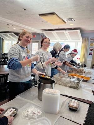Monomoy Regional High School students volunteer at Family Table Collaborative as part of Grade 8 Giving.