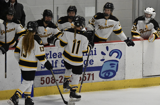 Nauset senior Sienna Reeves (11) celebrates with her teammates after scoring during the Nauset-Monomoy girls hockey team’s season-opening victory over Pope Francis on Sunday at Charles Moore Arena. BRAD JOYAL PHOTOS