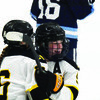 Monomoy sophomore Gaby Bassett, right, celebrates with Nauset junior Sophia Boucher after scoring the eventual game-winning goal in Nauset-Monomoy’s 2-1 victory over Sandwich on Saturday at Charles Moore Arena. BRAD JOYAL PHOTOS