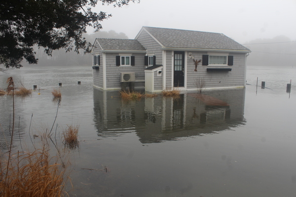 The cottage at 47 North Road on the Herring River side of the road fell victim once again to storm surge.