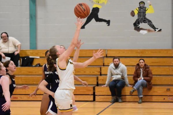 Nauset senior Samantha McIsaac makes a floater during Friday’s victory over Martha’s Vineyard at Nauset Regional Middle School in Orleans. BRAD JOYAL PHOTOS