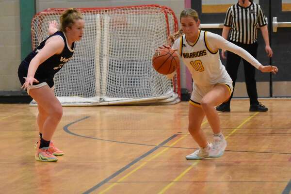 Nauset senior Jill Ernstrom dribbles after stealing the ball from the Vineyard.