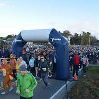 More than 2,000 people participated in Thursday morning's Turkey Trot race benefiting the Lower Cape Outreach Council.